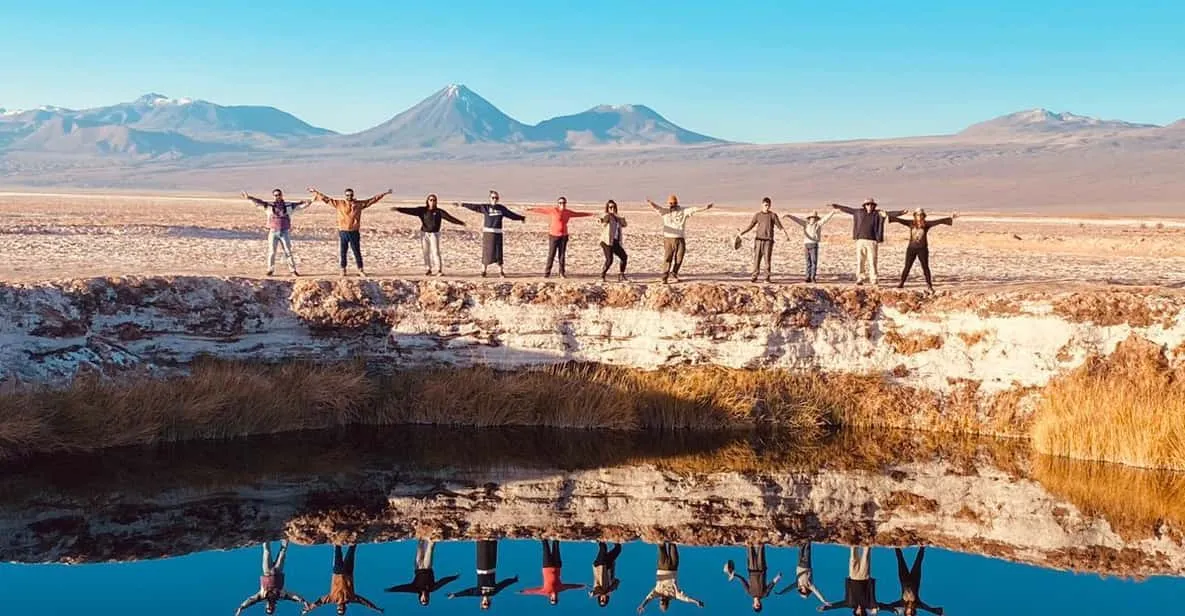 Swimmers floating in the salt water of Laguna Cejar on an Atacama Desert tour in the Salar de Atacama, Chile