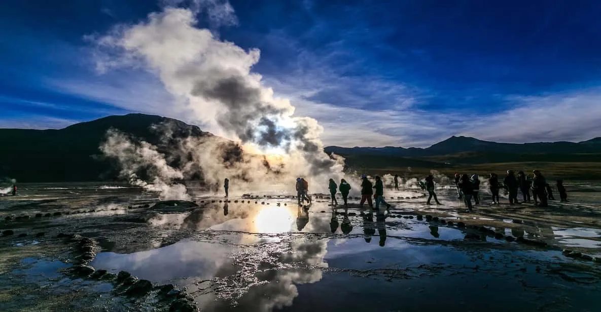 Steam columns rising at dawn at El Tatio geyser field on an Atacama Desert tour at 4,320 meters in Chile